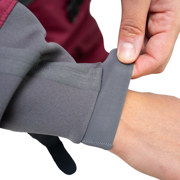 Immersion Research Dry Suit with Neoprene Wrists being stretched by Hand